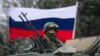 Russia Appears to Pull Some Troops from Ukraine Border