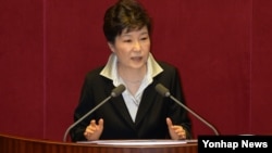 South Korean President Park Geun-hye gives a speech at the National Assembly in Seoul. She proposed a change to the constitution that would permit the president to serve more than one term. 