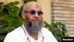 FILE - Al Nour party chief Younes Makhyoun speaks during an interview with Reuters at his house in the Nile Delta province of Al-Baheira, northwest of Cairo, June 9, 2014. 