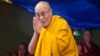 FILE - Tibetan spiritual leader the Dalai Lama greets devotees at the Tibetan Children's Village School in Dharmsala, India, in this undated photo. China has protested a weekend meeting between the Dalai Lama and the U.S. coordinator for Tibetan affairs.