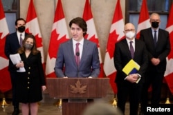 加拿大总理特鲁多2月14日在记者会上 （路透社）