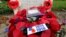 A wreath of poppies in memory of fallen soldiers is seen at Ramparts Cemetery in Ypres, Belgium, home of one of WWI's deadliest battles, June 25, 2014.