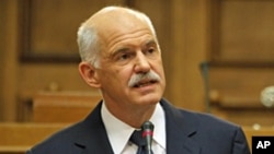 Greek Prime Minister George Papandreou , Oct 31, 2011