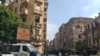 An Egyptian police van blocks a street leading to Cairo's Tahrir square, Sept. 27, 2019, in anticipation of anti-government protests.
