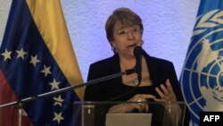 FILE - U.N. High Commissioner for Human Rights, Michelle Bachelet, speaks during a press conference in Caracas, June 21, 2019. 