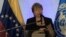 FILE - U.N. High Commissioner for Human Rights, Michelle Bachelet, speaks during a press conference in Caracas, June 21, 2019. 