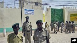 Guards stand outside the prison that houses 70 pirate inmates, in the breakaway northern republic of Somaliland, March 2011. (file photo)