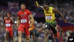 Jamaica's Usain Bolt crosses the finish line ahead of United States' Ryan Bailey to win the men's 4x100-meter relay final during the athletics in the Olympic Park during the 2012 Summer Olympics, Saturday, Aug. 11, 2012, in London.