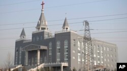 FILE - In this Dec. 6, 2009, file photo, the Golden Lampstand Church is seen in Linfen in northern China's Shanxi Province. 