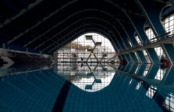 FILE - View of a swimming pool closed to the public in Prague, Czech Republic, Oct. 9, 2020. The Czech government has responded to record-high numbers of coronavirus infections by imposing further restrictive measures to try to contain the spread.