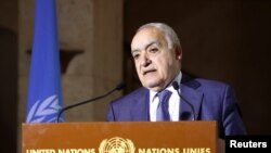 FILE - U.N. Envoy for Libya, Ghassan Salame holds a news briefing after a meeting of the 5+5 Libyan Joint Military Commission in Geneva, Switzerland, Feb. 6, 2020. 