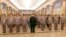 North Korean leader Kim Jong Un (C) visits the Kumsusan Palace of the Sun on the 72nd birth anniversary of North Korea's late leader Kim Jong Il in this photo released by North Korea's Korean Central News Agency on February 16, 2014. 