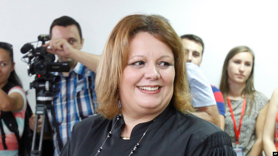 FILE - Public prosecutor Katica Janeva takes an oath as a special prosecutor to investigate claims that the conservative government ordered a massive wiretapping operation, Skopje, Macedonia, Sept. 16, 2015. Janeva unexpectedly resigned in July.