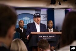 President Donald Trump speaks during a news conference about the coronavirus, in the James Brady Briefing Room at the White House, March 14, 2020, in Washington.