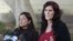 Cindy Lee Garcia, right, and attorney M. Cris Armenta hold a news conference before a hearing at Los Angeles Superior Court in Los Angeles, September 20, 2012.