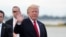 U.S. President Donald Trump arrives to board Air Force One to return to Washington at the conclusion on their holiday vacation, from Palm Beach International Airport in West Palm Beach, Florida, Jan. 1, 2018.