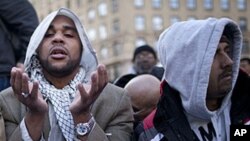 Dawud Walid, executive director of the Michigan Chapter of Council on American-Islamic Relations prays in Foley Square in New York.