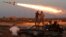 Fighters of Libyan forces allied with the U.N.-backed government fire a rocket at Islamic State fighters in Sirte, Libya, August 4, 2016.