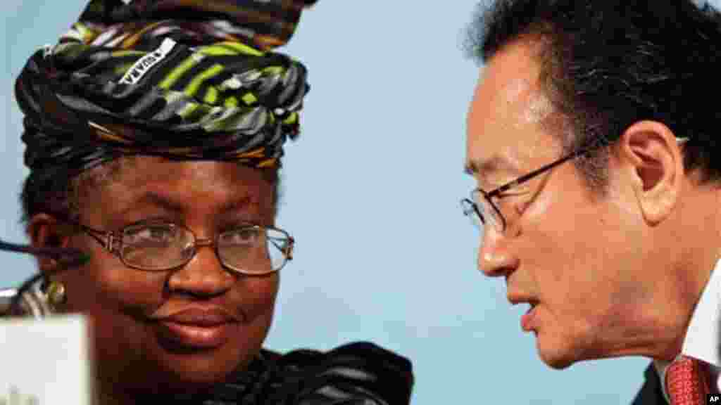 Managing Director of the World Bank Ngozi Okonjo-Iweala listens to Il SaKong, chairman of the World Bank conference during an opening press conference at the G-20 Finance and Central Bank Governors Meeting in South Korea, June 4, 2010.