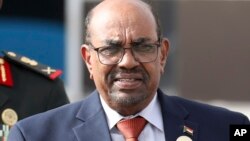 FILE - Sudanese President Omar al-Bashir is seen leaving the African Union summit, in Nouakchott, Mauritania, July 2, 2018.