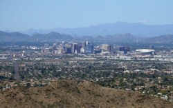 The downtown Phoenix skyline is easier to see, April 7, 2020, as fewer motorists in Arizona are driving, following the state stay-at-home order due to the coronavirus.