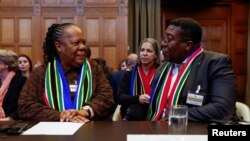 FILE - South African Foreign Minister Naledi Pandor and South African Ambassador to the Netherlands Vusimuzi Madonsela speak on the day the International Court of Justice rule on emergency measures against Israel, in The Hague, Netherlands, January 26, 2024.