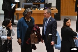 FILE— US Ambassador to the UN Linda Thomas-Greenfield speaks with Israel's Ambassador to the UN Gilad Erdan after a UN Security Council motion for a Gaza ceasefire and hostage deal vote at UN headquarters in New York, on March 22, 2024.