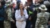 Pemimpin oposisi Venezuela Maria Corina Machado tiba di salah satu tempat pemungutan suara di Caracas, Venezuela, untuk menggunakan hak pilihnya dalam pilpres negara tersebut pada 28 Juli 2024. (Foto: AFP/Federico Parra)