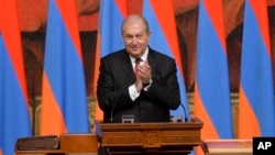 Armenian President Armen Sarkisian gestures as he speaks during the presidential inauguration ceremony in Yerevan, Armenia, April 9, 2018. 