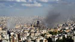 Asap mengepul dari kawasan yang terkena serangan udara Israel di Dahieh, Beirut, Lebanon, Rabu, 2 Oktober 2024. (Hussein Malla/AP)