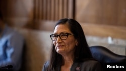 FILE PHOTO: Rep. Deb Haaland, D-NM, looks on during a Senate Committee on Energy and Natural Resources hearing on her nomination to be Interior Secretary on Capitol Hill in Washington, Feb. 23, 2021.