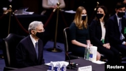 Judge Merrick Garland is seated to testify before a Senate Judiciary Committee hearing on his nomination to be U.S. Attorney General on Capitol Hill in Washington, U.S., Feb. 22, 2021.