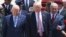 US President Donald Trump walks on his arrival accompanied by the Israeli President Rueben Rivlin, right, and Prime Minister Benjamin Netanyahu in Tel Aviv, May 22,2017.