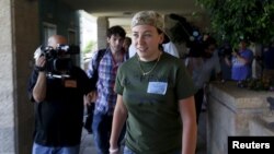 Gill Rosenberg walks through the Knesset, Israel's parliament, in Jerusalem July 13, 2015.