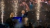 Israel's Prime Minister Benjamin Netanyahu, accompanied by his wife Sara, waves to his supporters after polls for Israel's general elections closed in Tel Aviv, Israel, April 10, 2019.