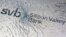 FILE - SVB (Silicon Valley Bank) logo is seen through broken glass in this illustration taken March 10, 2023.