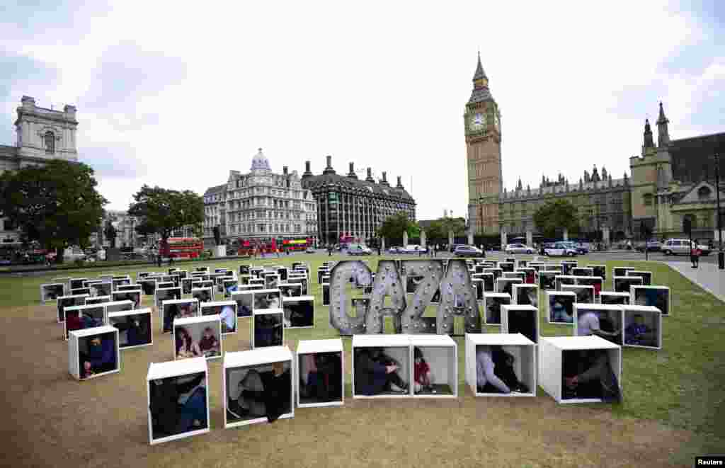 Some 150 men, women and children cram into boxes&nbsp;at Parliament Square in London.&nbsp; The event, organized by Oxfam, was to call attention to conditions of Gaza residents trapped by the blockade.