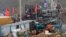Rescuers work at the Hushan gold mine where workers were trapped underground after the Jauary 10 explosion, in Qixia