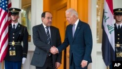 Wakil Presiden AS, Joe Biden menyambut PM Irak Nouri al-Maliki di rumah kediamannya di Washington DC, Rabu (30/10). PM Irak dijadwalkan akan bertemu Menhan AS Chuck Hagel hari ini (31/10) dan Presiden Obama hari Jumat (1/11).