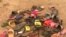 FILE - Flip flop sandals belonging to students of Bethel Baptist High School are seen following an attack by gunmen in Damishi Kaduna, Nigeria, July 6, 2021. 