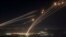 TOPSHOT - Rockets fired from southern Lebanon are intercepted by Israel's Iron Dome air defence system over the Upper Galilee region in northern Israel, on August 4, 2024, amid ongoing cross-border clashes between Israeli troops and Lebanon's Hezbollah fi