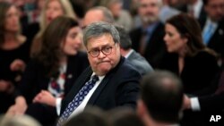 Attorney General William Barr arrives before President Donald Trump speaks in the White House about his judicial appointments, Nov. 6, 2019, in Washington.