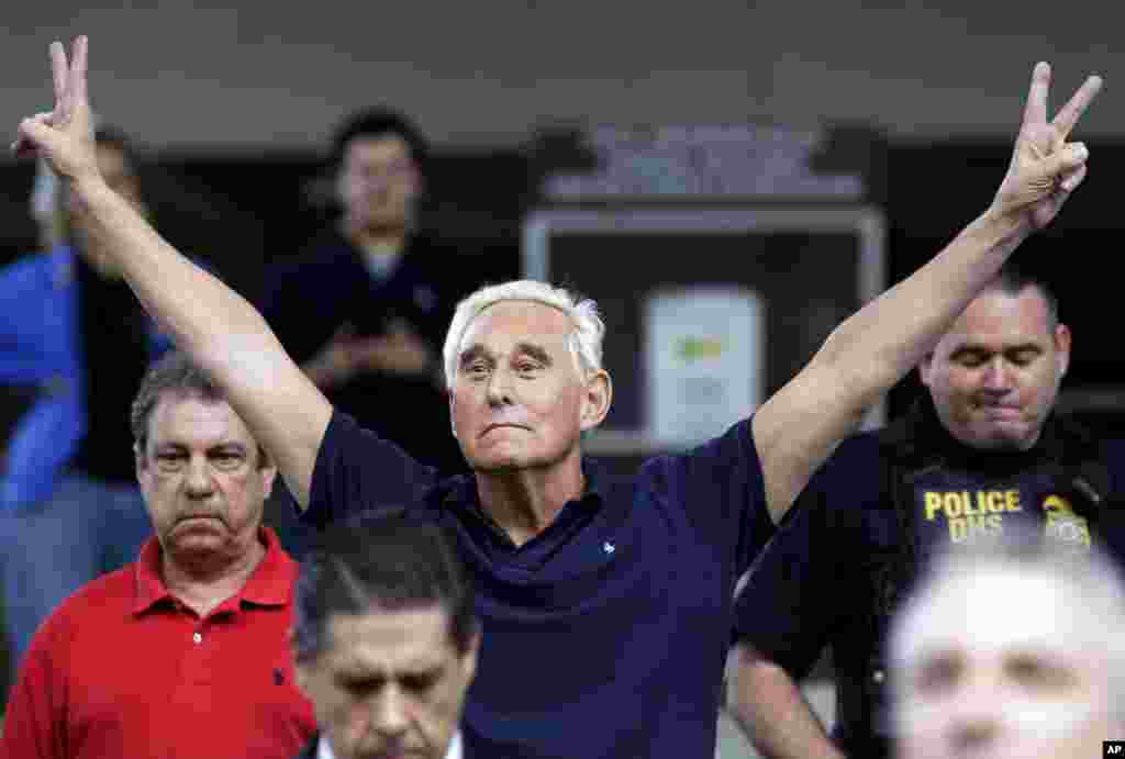 Former campaign adviser for President Donald Trump, Roger Stone walks out of the federal courthouse following a hearing in Fort Lauderdale, Fla. Stone was later charged on several counts, including obstruction of an official proceeding, making false statements, and witness tampering.