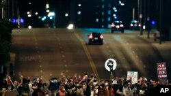 Demonstrators march up Main Street in Kansas City, Mo. June 4, 2020, during a protest over the death of George Floyd, who died May 25 after being restrained by police in Minneapolis. 