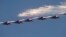 MiG-29 jet fighters of Russian aerobatic team Strizhi (Swifts) perform during a ceremony in Batajnica, military airport near Belgrade, Oct. 20, 2017.