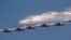 MiG-29 jet fighters of Russian aerobatic team Strizhi (Swifts) perform during a ceremony in Batajnica, military airport near Belgrade, Oct. 20, 2017.