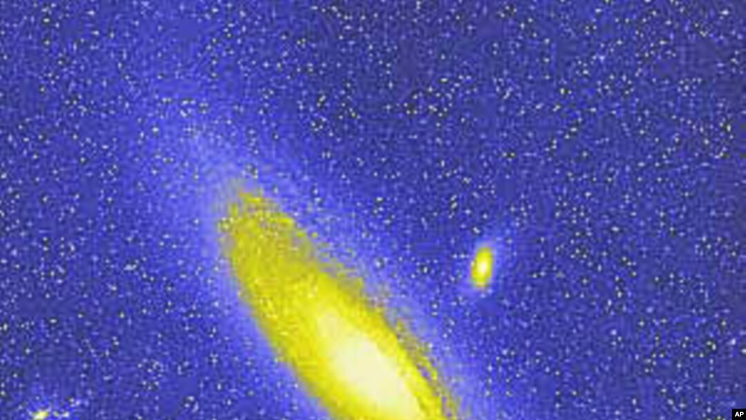 Andromeda is the nearest major galaxy to our own Milky Way Galaxy, and the diffuse light from Andromeda Galaxy is caused by the hundreds of billions of stars that compose it.