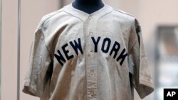 The jersey Babe Ruth wore in the 1932 World Series game in which he "called his shot" is displayed at Heritage Auction in Irving, Texas, on Aug. 21, 2024. The jersey could sell for as much as $30 million.