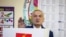 FILE - Albanian President Ilir Meta gestures as he votes during parliamentary elections in the capital Tirana, Albania, April 25, 2021.