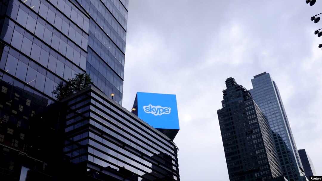 FILE - An advertisement for Skype is seen over 42nd Street in Manhattan, New York.
